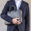 DAIM | Mallette en cuir